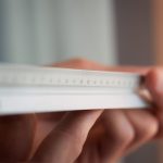 Architect holding a ruler for measuring. closeup, selective focus